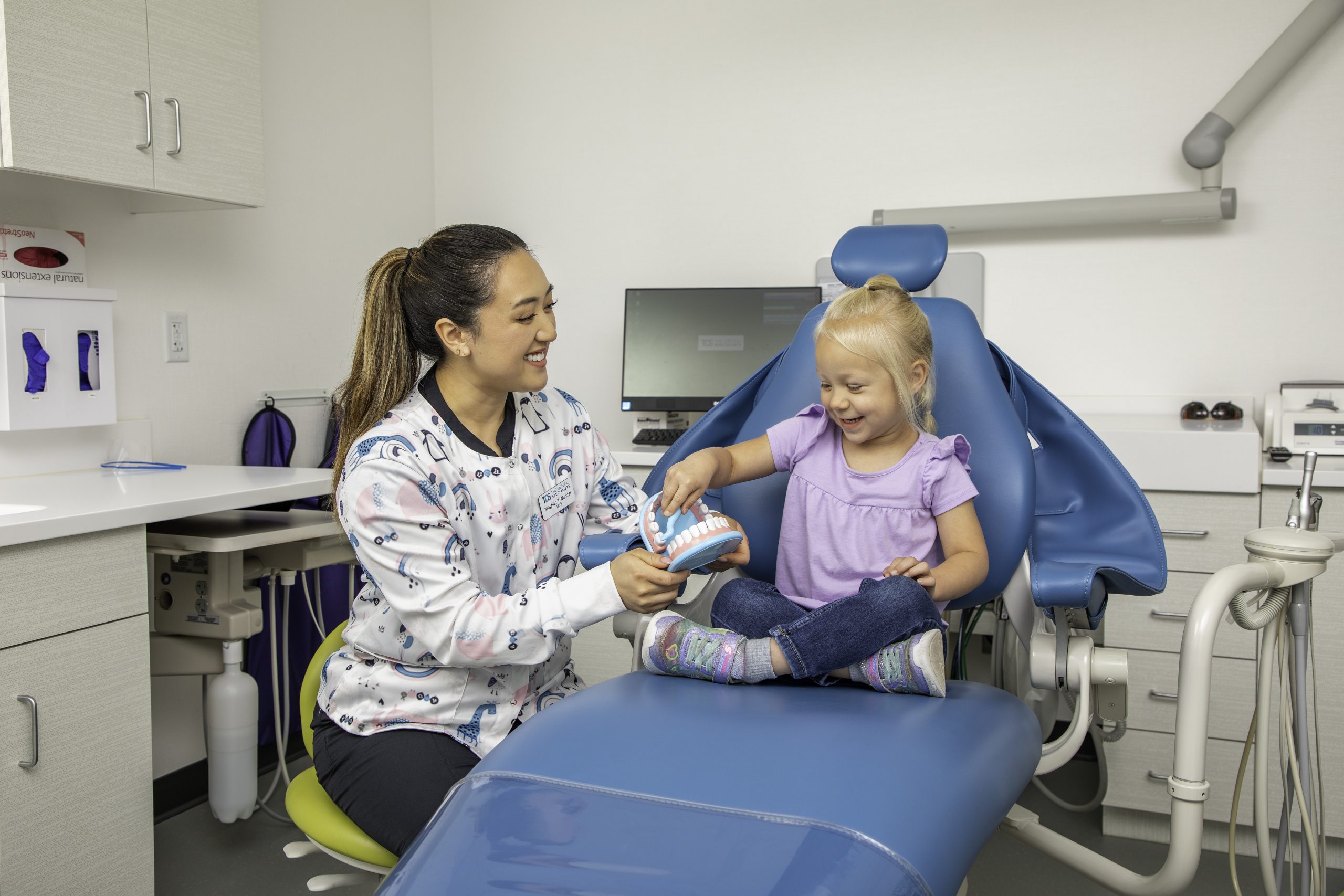 Dr. Meghan Mester speaking with a pediatric dental patient.